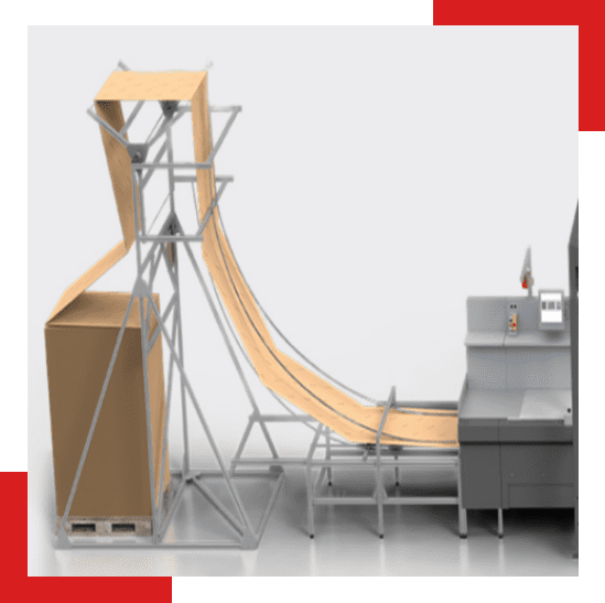 Automated packaging system with a tall metal frame guiding a continuous sheet of cardboard down a curved chute onto a workstation. A large palletized box is positioned at the base of the structure.