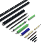 A variety of roller assemblies used in paper transportation systems, featuring different sizes, colors, and surface textures, designed for precise movement and handling of paper materials in industrial settings.